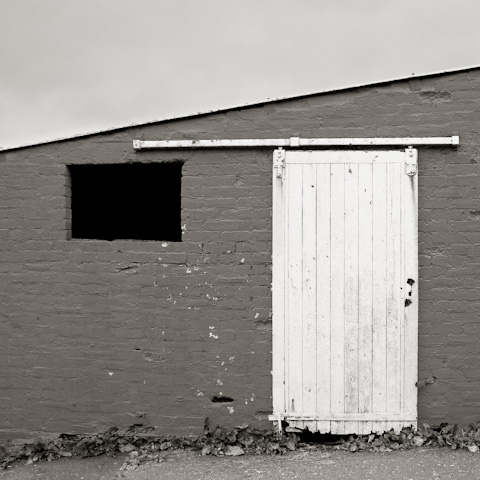 Black Window and White Door, Farm Building, Lanarkshire, Scotland.